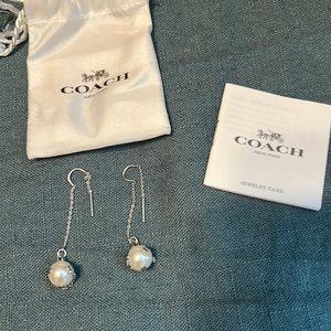Coach Pearl earrings. With dustbag and card.